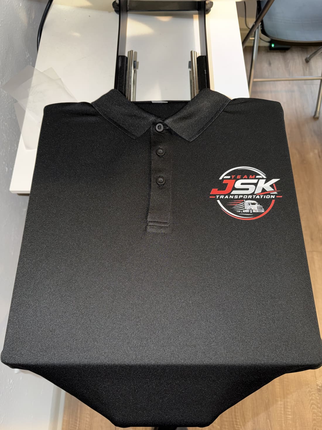 JSK Transportation custom branded polo