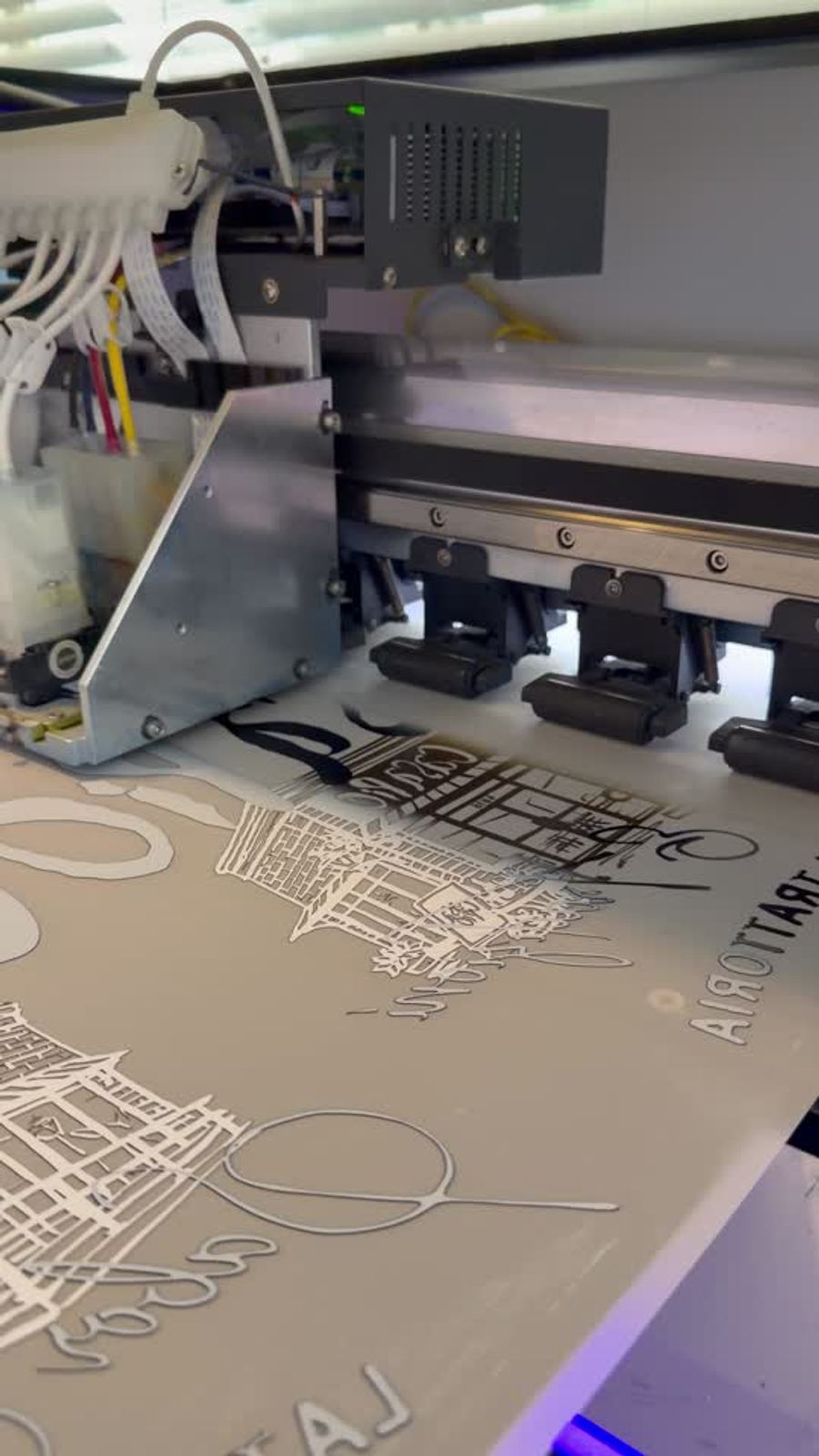 DTF printer applying a custom design transfer