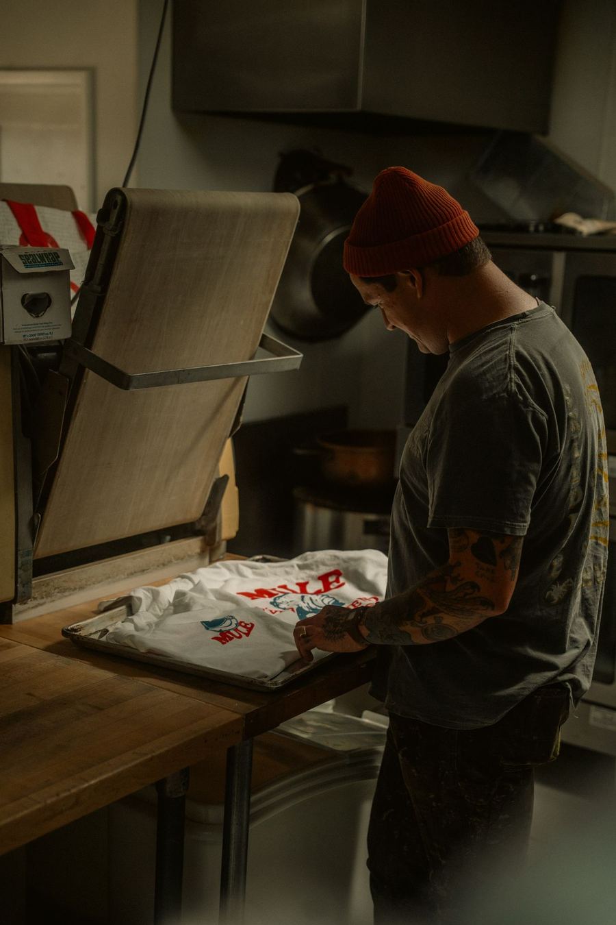Heat press machine transferring a custom design